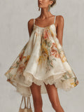 Liliana | Vestido corto de corte A en organza beige con motivo floral y borde de encaje