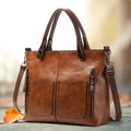 Angela™ | Bolso de Mano Versátil