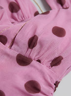 Vestido maxi sin espalda con lazo en la cintura de lunares